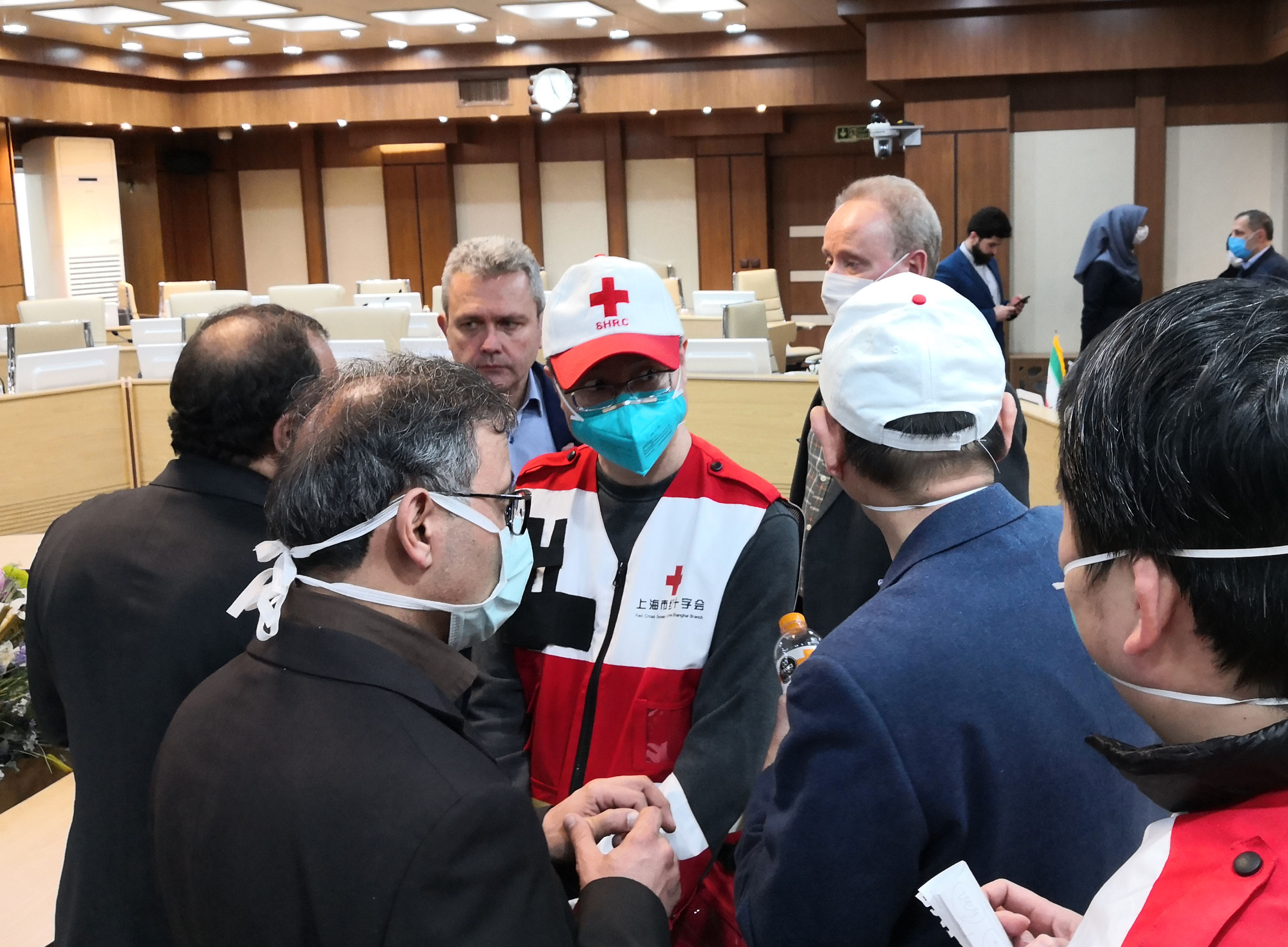 Chinese medical team members meet with Iranian medical experts in Tehran, Iran, March 7, 2020. (Xinhua)